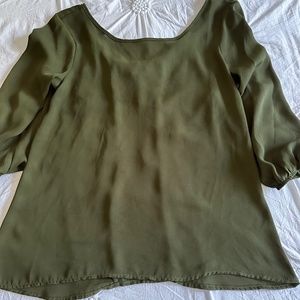Green blouse with bow in back